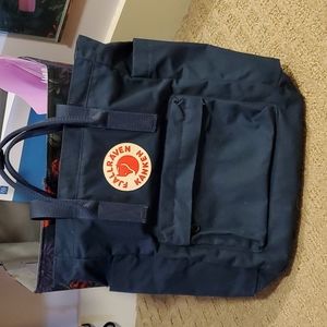 Navy blue Fjallraven Kanken convertible bag